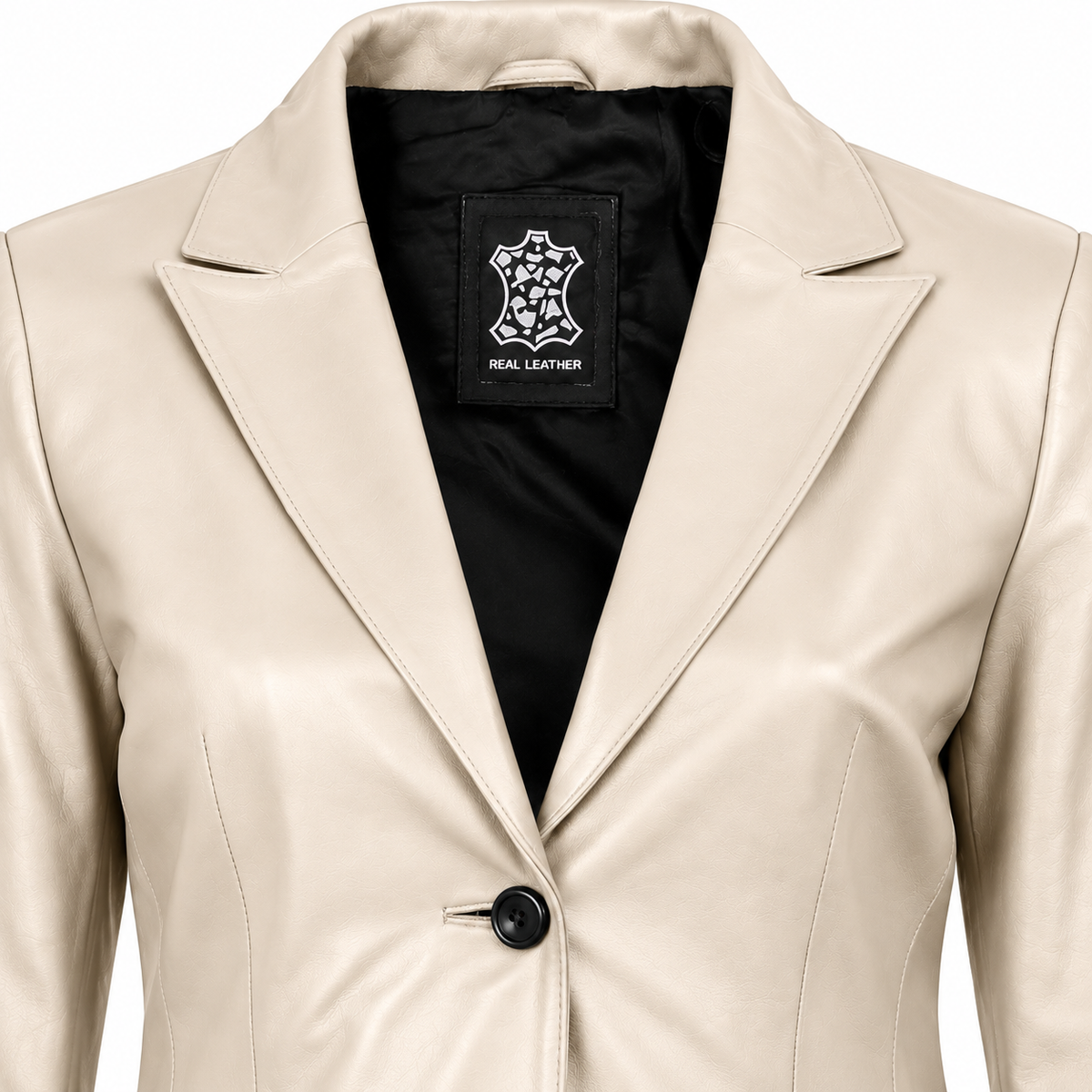 Close-up of a cream leather blazer jacket with a single black button and a black interior label